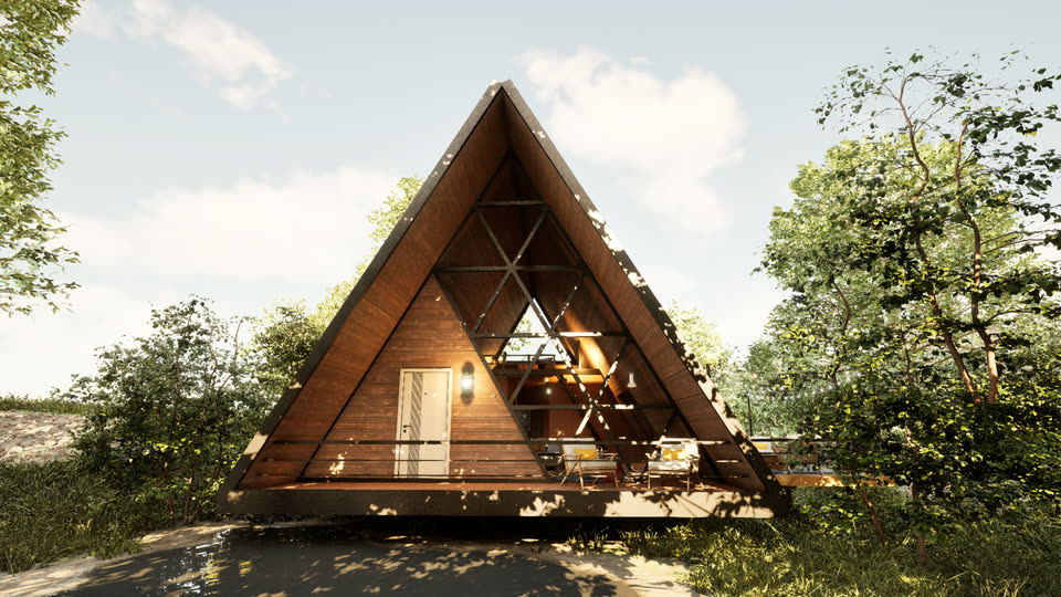 The A-frame cabin from the front, its glazed gable facing a forest clearing