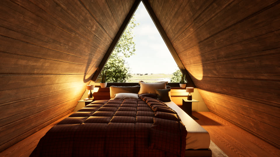 Loft bed centered under the peak of the A-frame, daytime